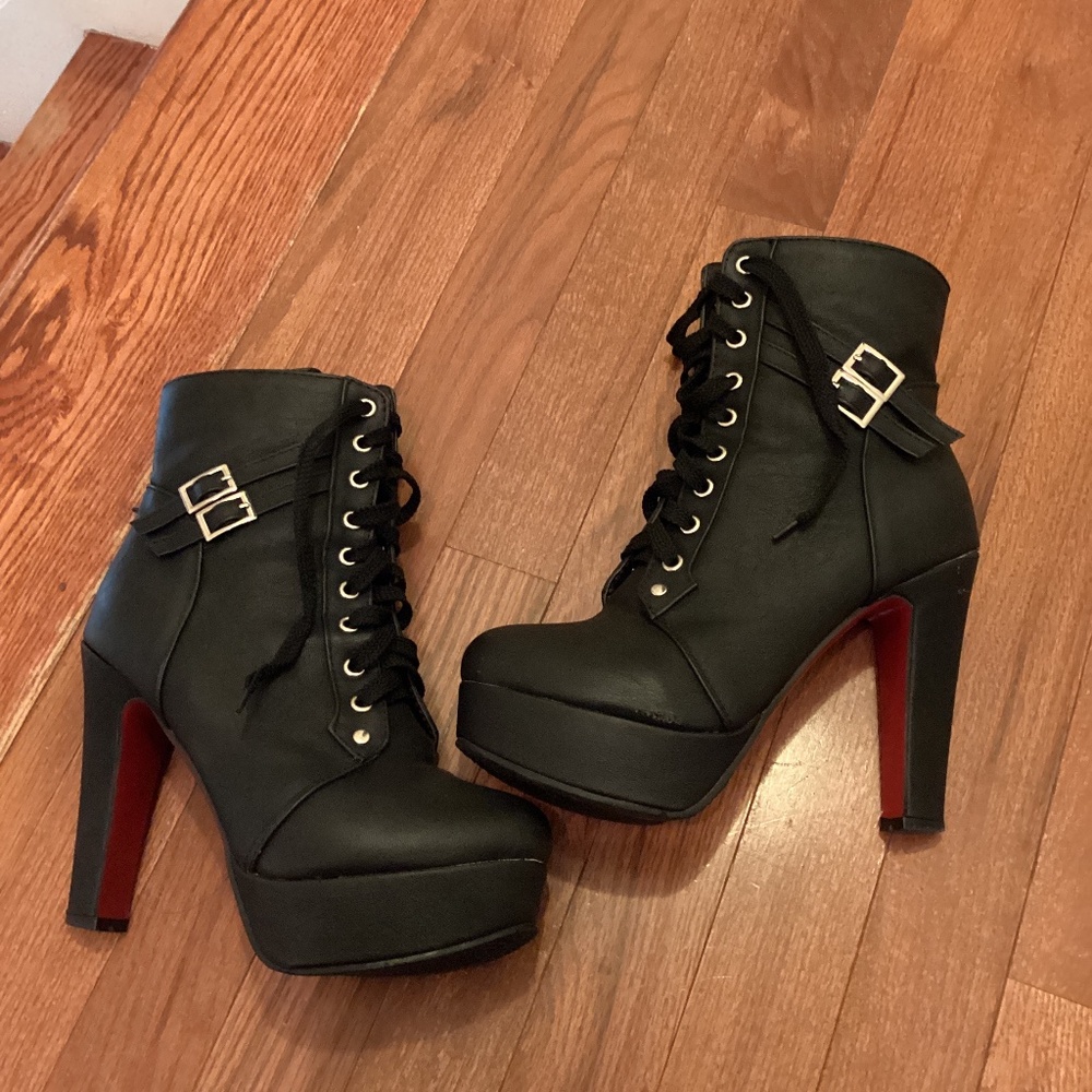 black leather heeled ankle boots. Red sole. Size 8